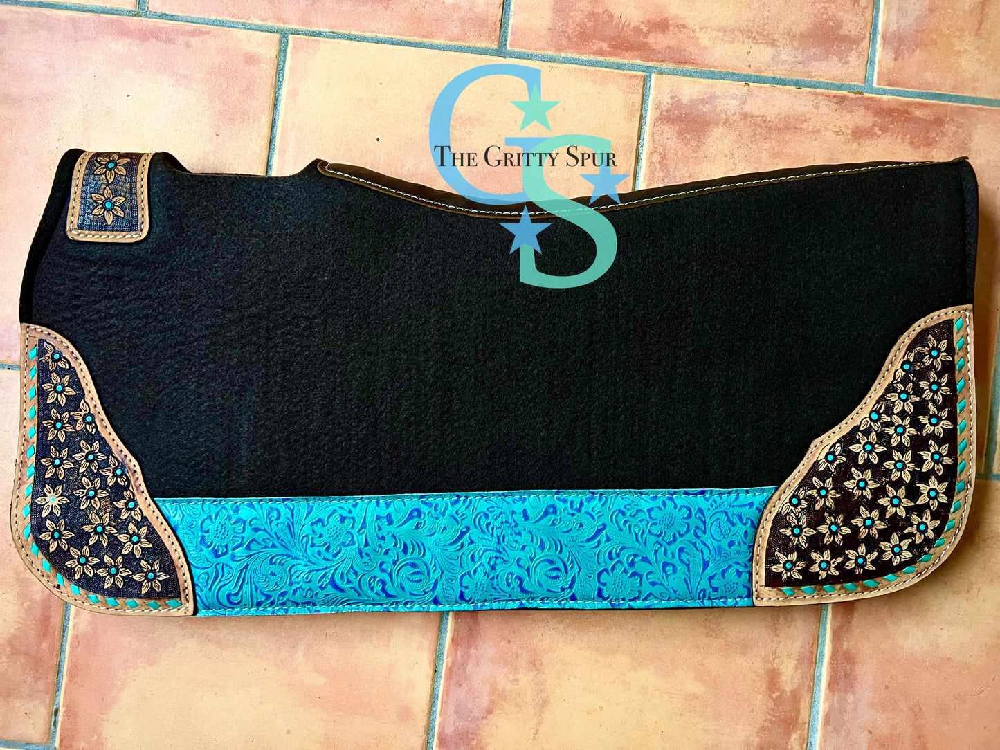 32" x 31" felt teal accented saddle pad with flower tooling