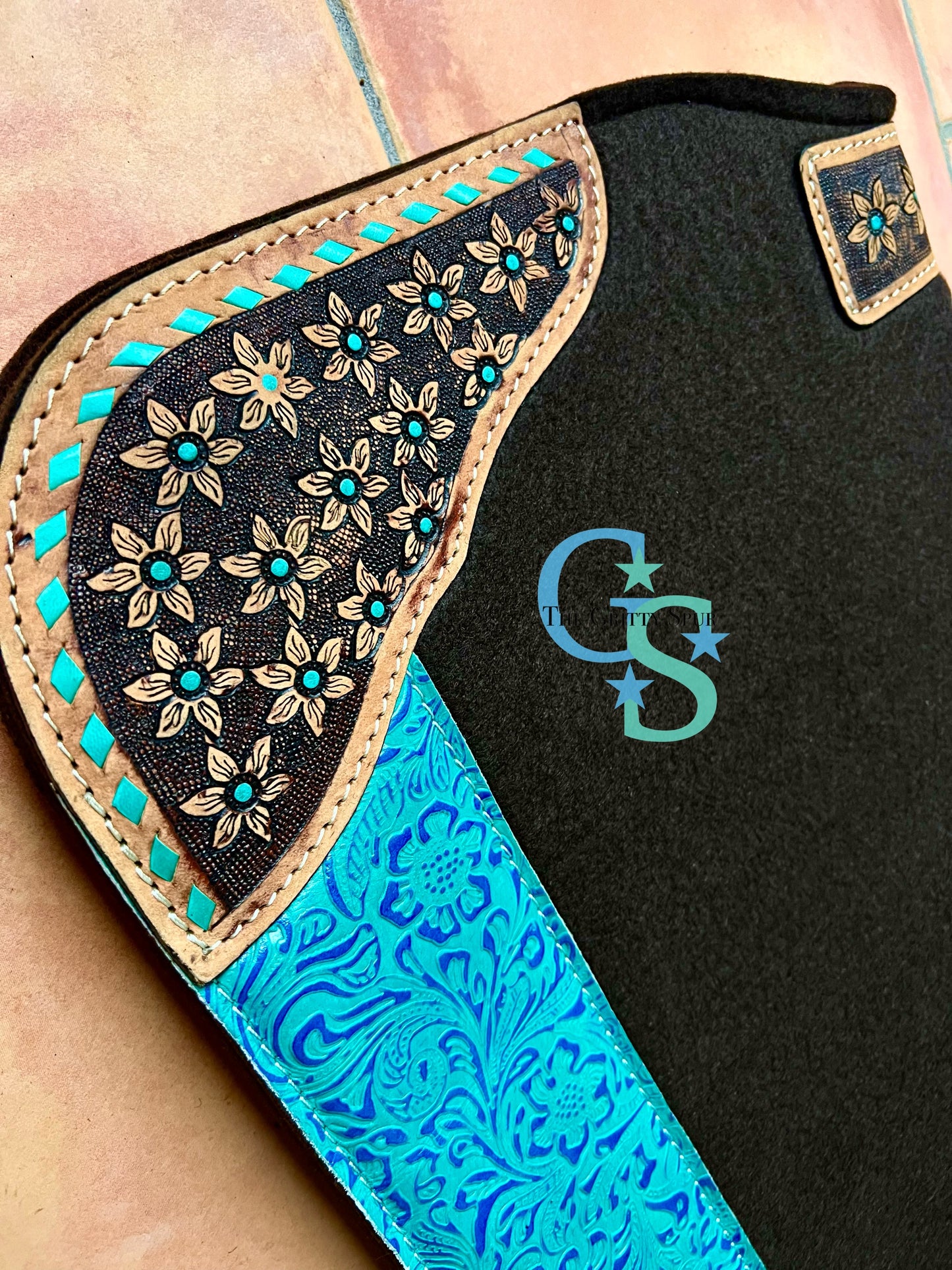 32" x 31" felt teal accented saddle pad with flower tooling