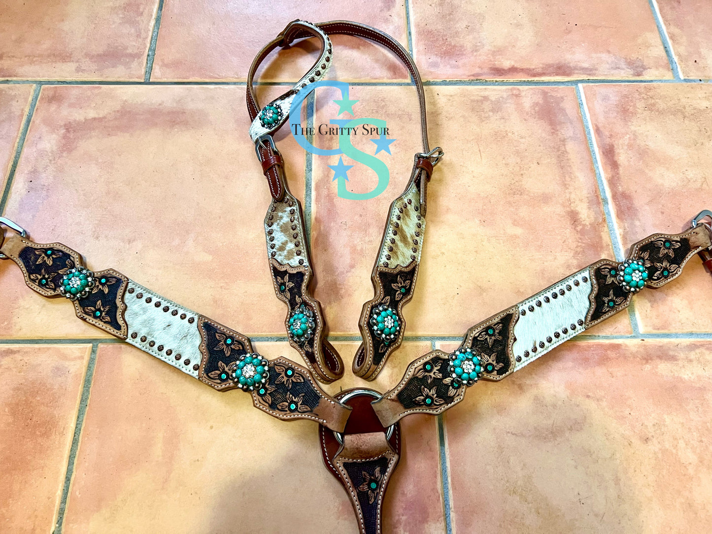 Hair on cowhide one ear teal with flower tack set