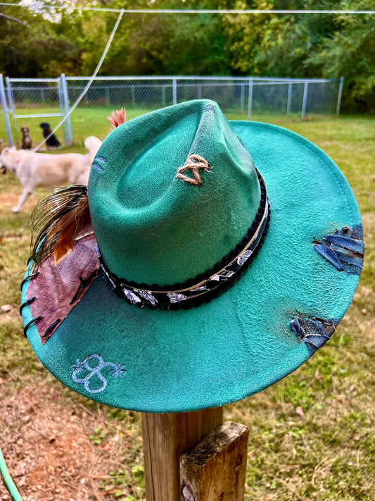 Gorgeous teal hat with leather accents