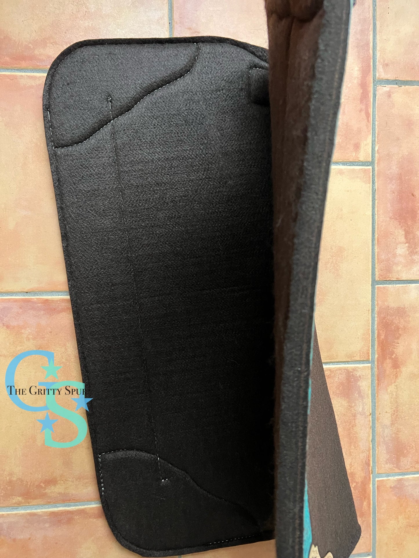 32" x 31" felt teal accented saddle pad with flower tooling