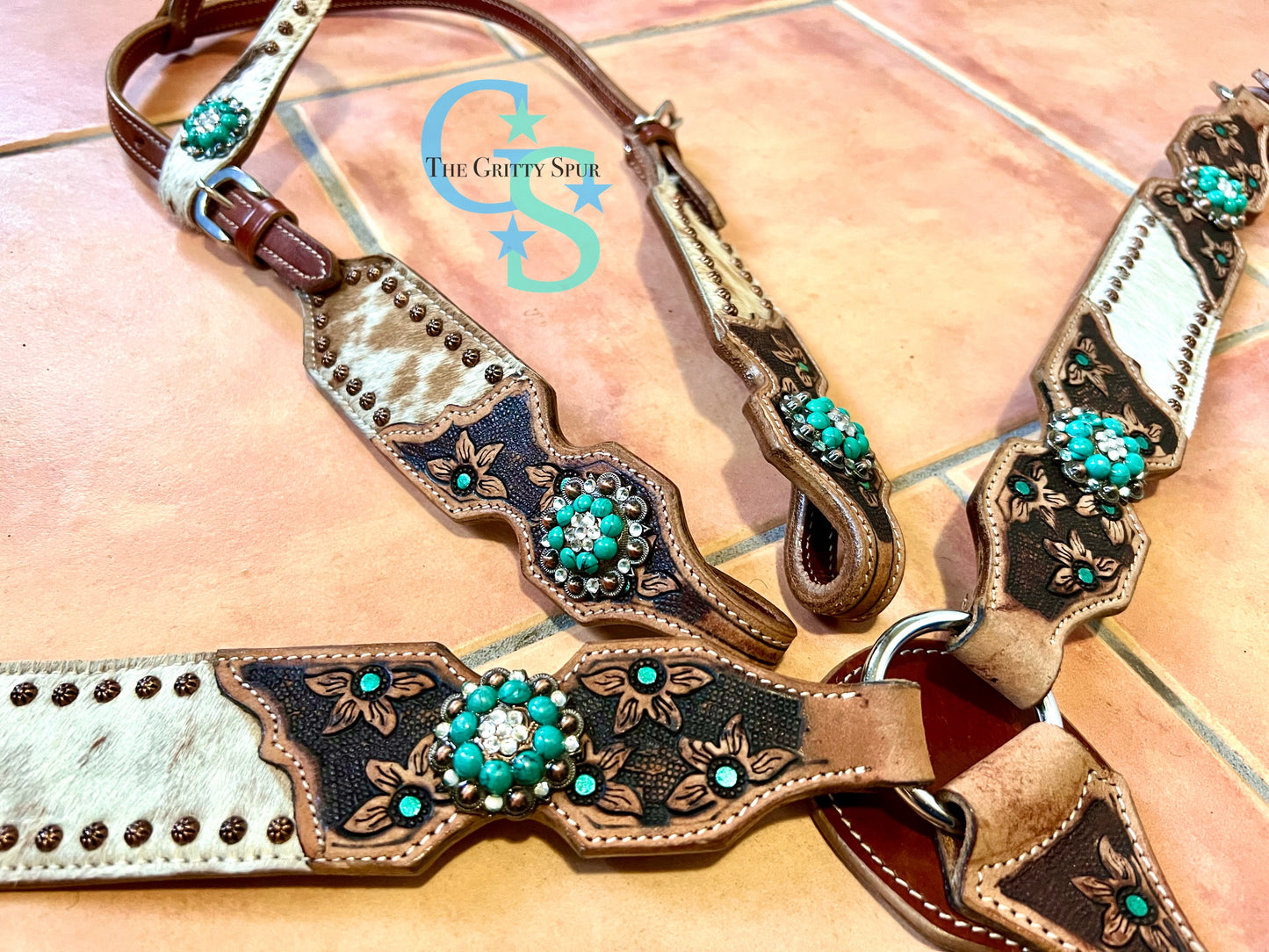 Hair on cowhide one ear teal with flower tack set
