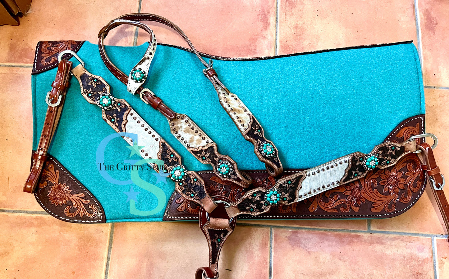 Hair on cowhide one ear teal with flower tack set