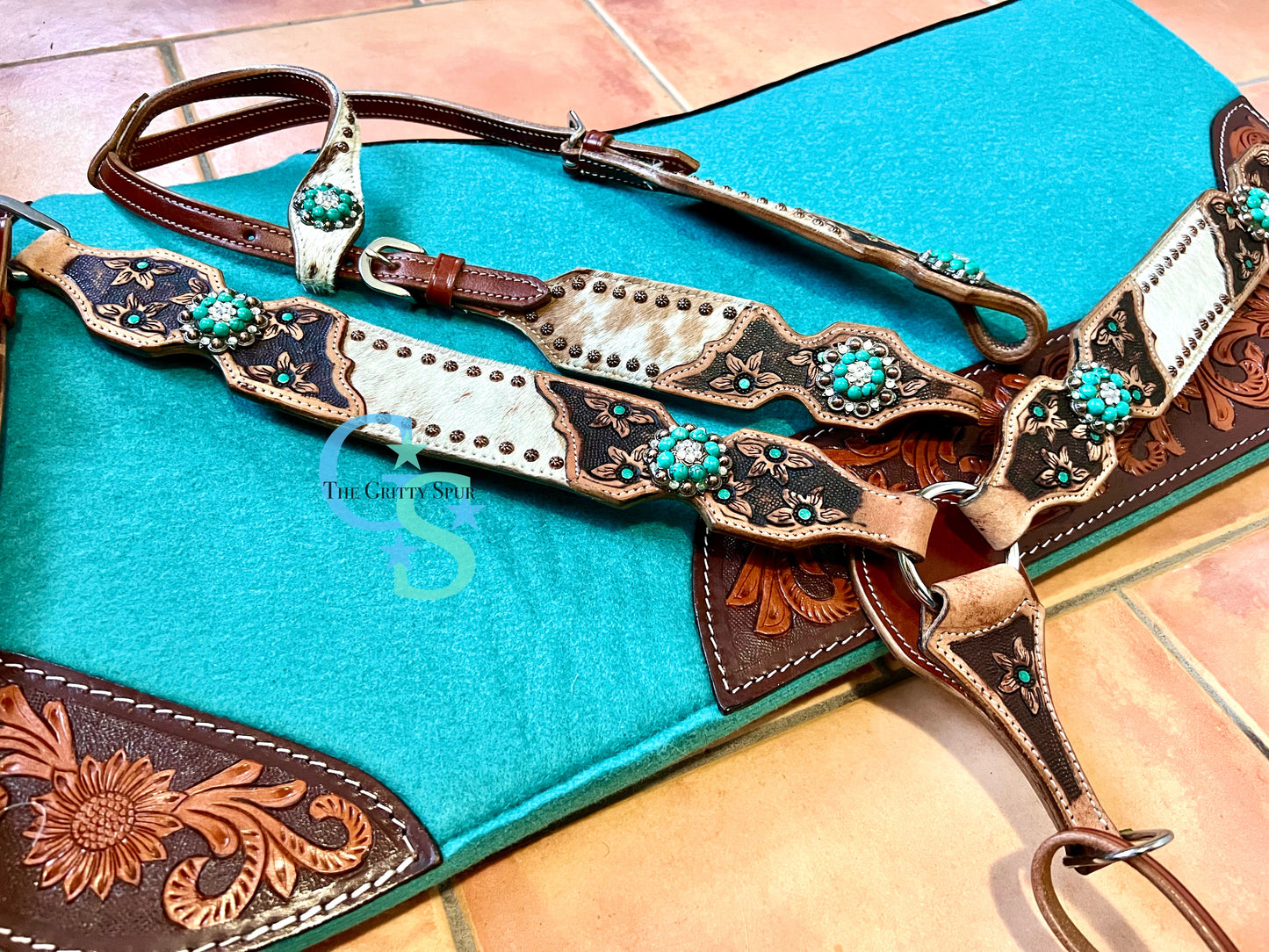 Hair on cowhide one ear teal with flower tack set