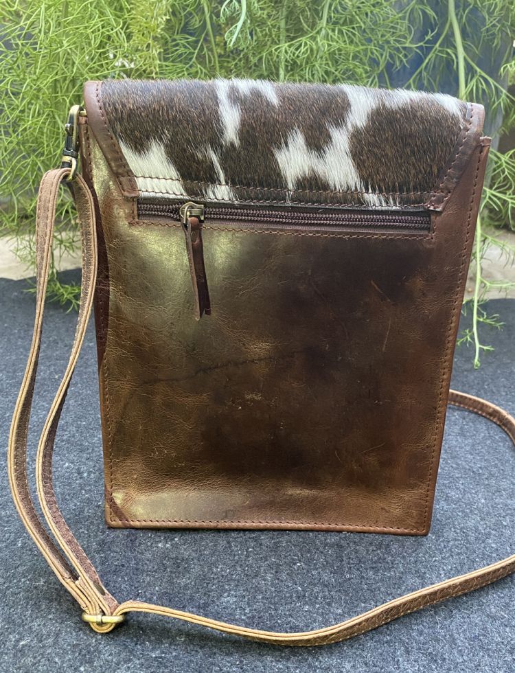Leather crossbody bag with cowhide