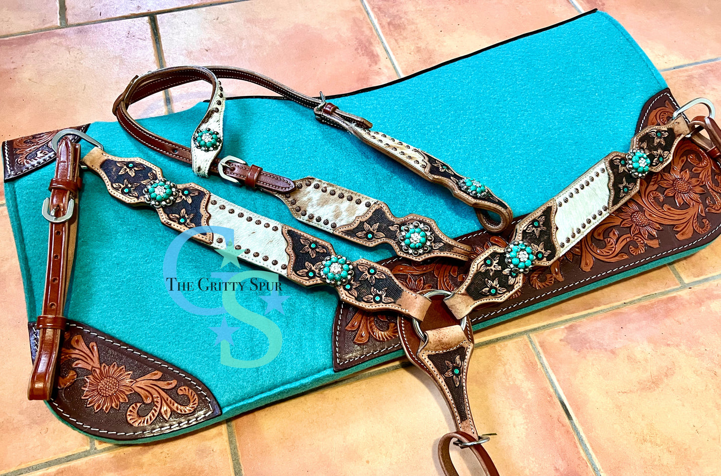 Hair on cowhide one ear teal with flower tack set