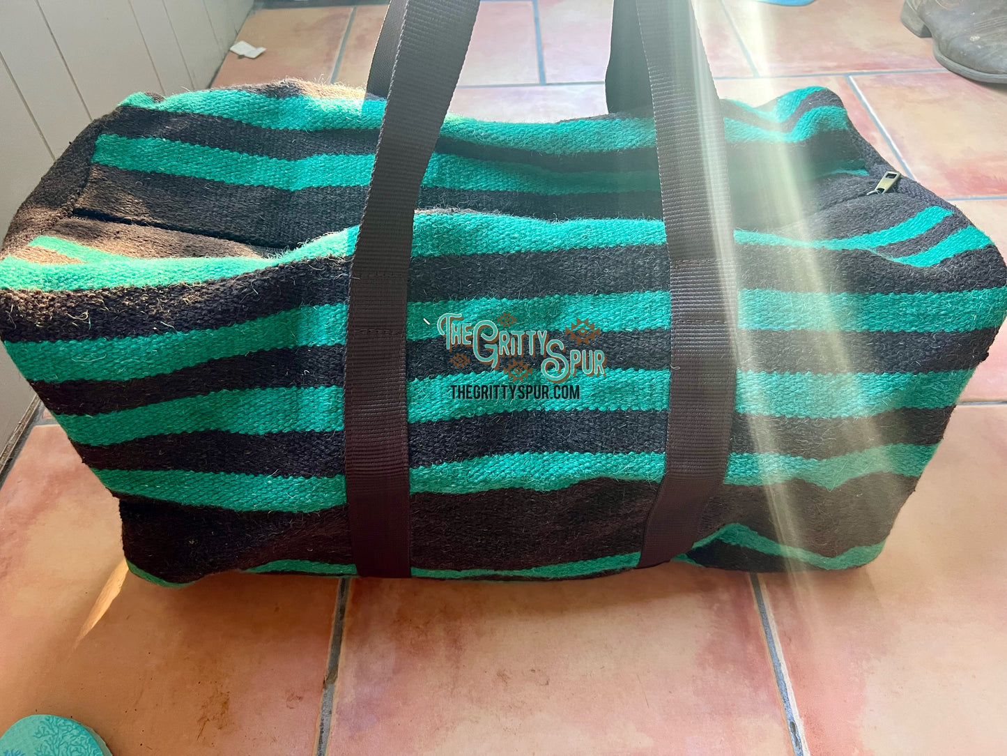 Turquoise and brown wool serape saddle blanket duffle bag