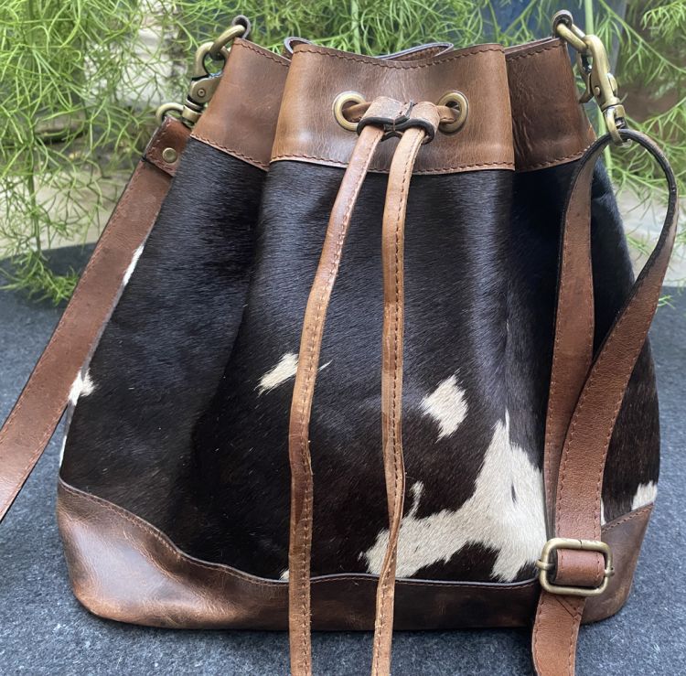 Hair on cowhide bucket bag